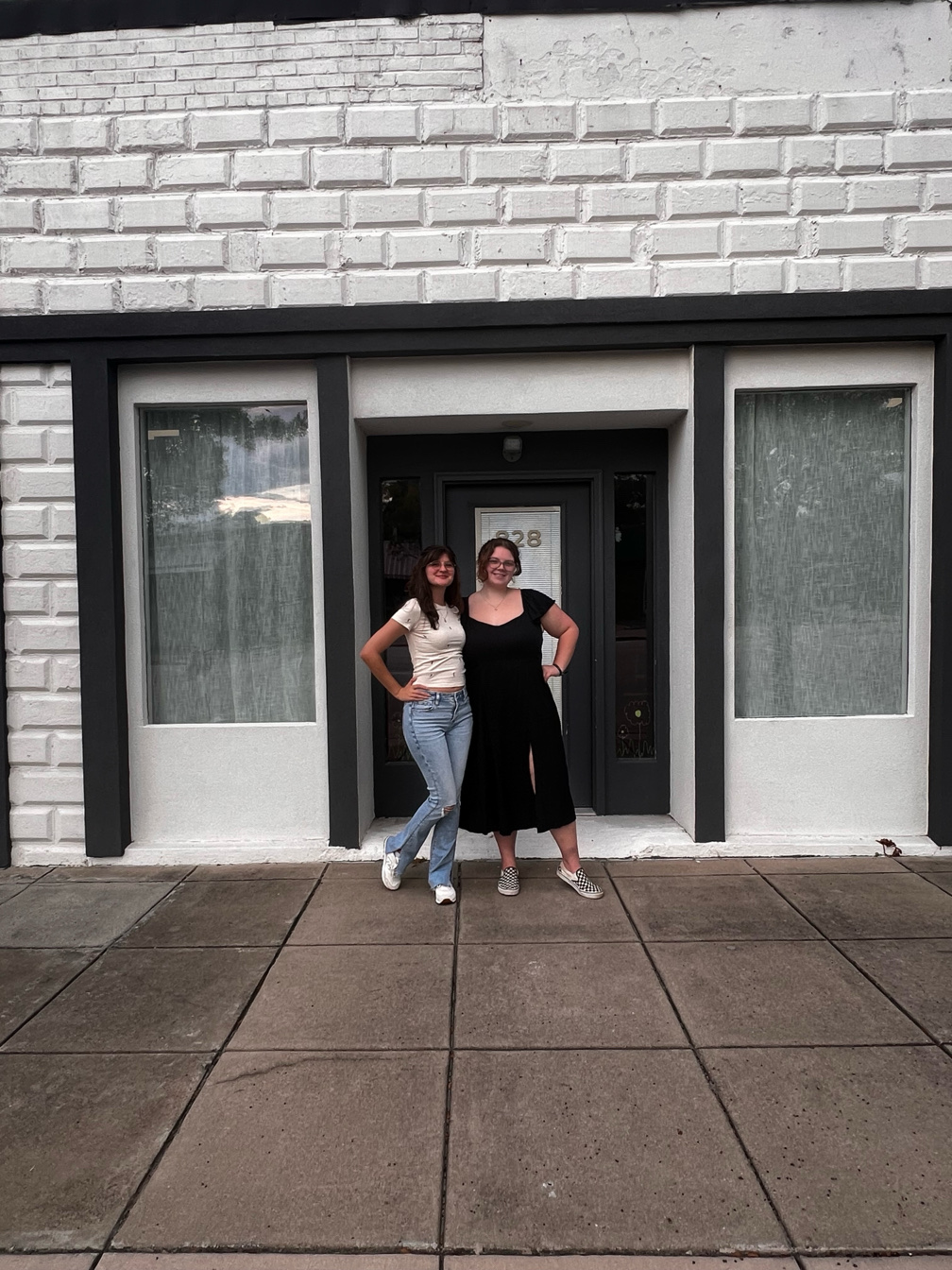 Lauren and KayLynn in front of the shop
