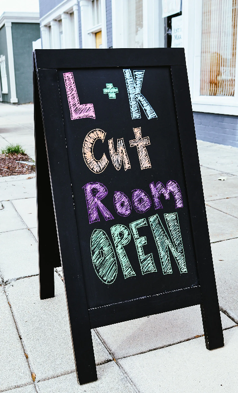 L+K Cut Room Open sign